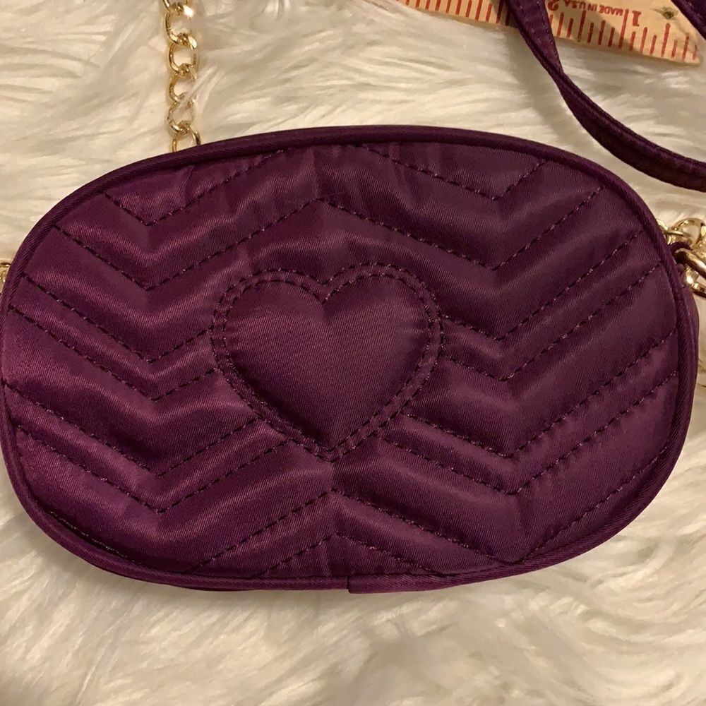 Mini Crossbody purple bag with removable gold chains.